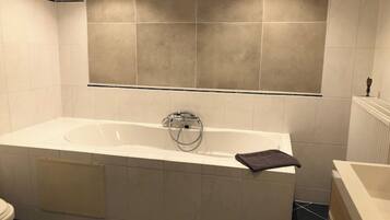 Shower, towels, toilet paper