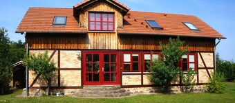 Maison de vacances familiale avec terrasse privée, jardin commun et balcon