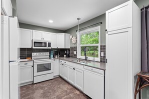 Private kitchen - Penn Street Retreat – Pet Friendly w/ Yard & Garage (Lawrence)