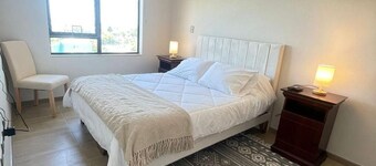 Modern 1D1B apartment with fully furnished parking.