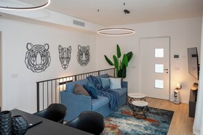 Departamento superior, patio | Área de sala de estar