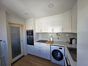 Private kitchen - Stylish Apartment in Coimbra's Heart (Coimbra)