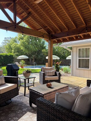 Terrace/patio - Spacious 4 Bed/3 Bath house with pool, fenced backyard, fire pit, covered porch. (St. Simons Island)