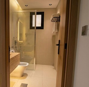 Hair dryer, slippers, towels, soap