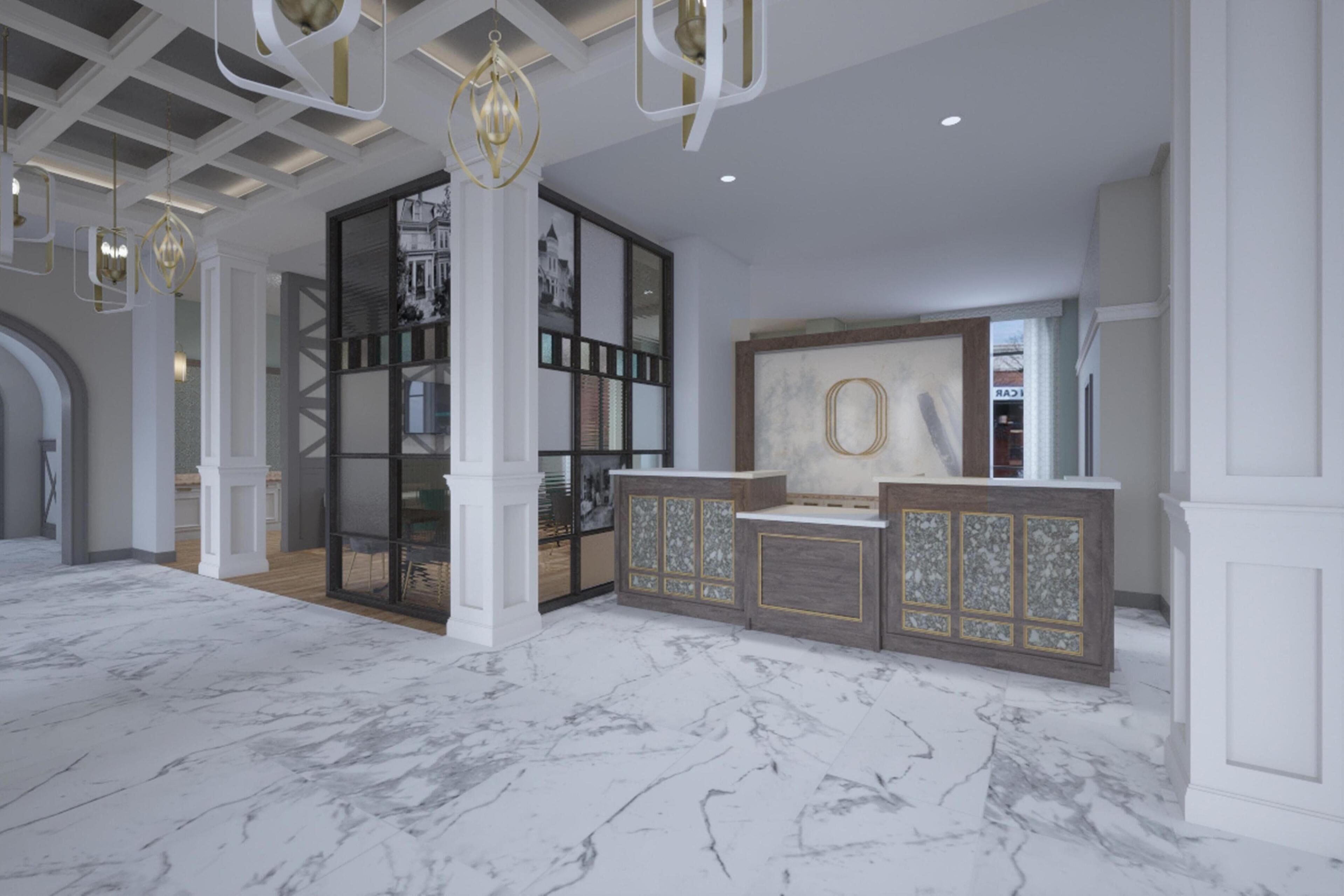 A spacious lobby with marble flooring, a reception desk, and a large framed artwork on the wall.
