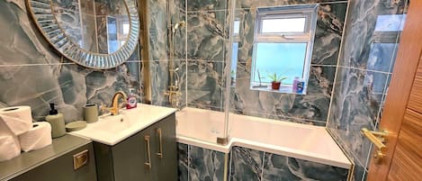 Shower, hair dryer, shampoo