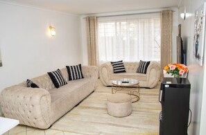 Living area - CozyUrbanHomes-Elegant 2 Bedroom Apartment (Nakuru)