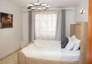 Iron/ironing board, Internet, bed sheets - CozyUrbanHomes-Elegant 2 Bedroom Apartment (Nakuru)