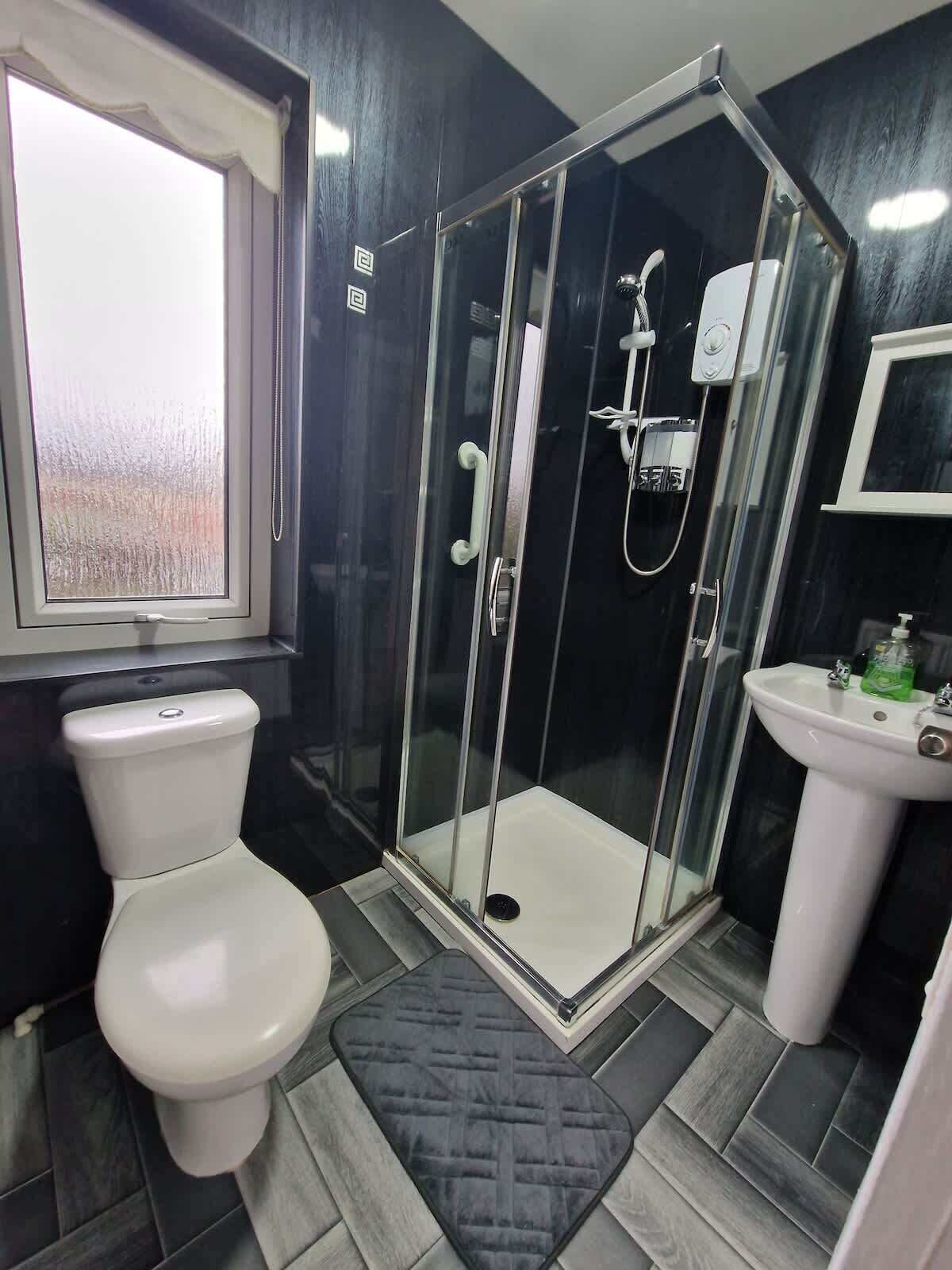 Shower, hair dryer, shampoo