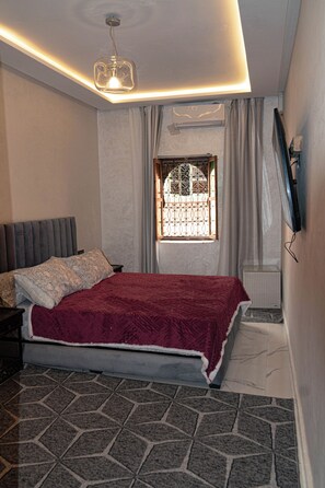 Apartamento conforto | Cortinas blackout, ferros/tábuas de passar roupa