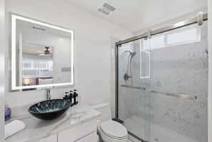 Hair dryer, towels, soap, shampoo