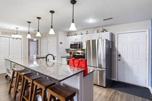Condo, Multiple Beds, Patio, Pool View (831 Winn Rd Unit H15) | Private kitchen - Lakefront Condo With Boat Slip (Osage Beach)
