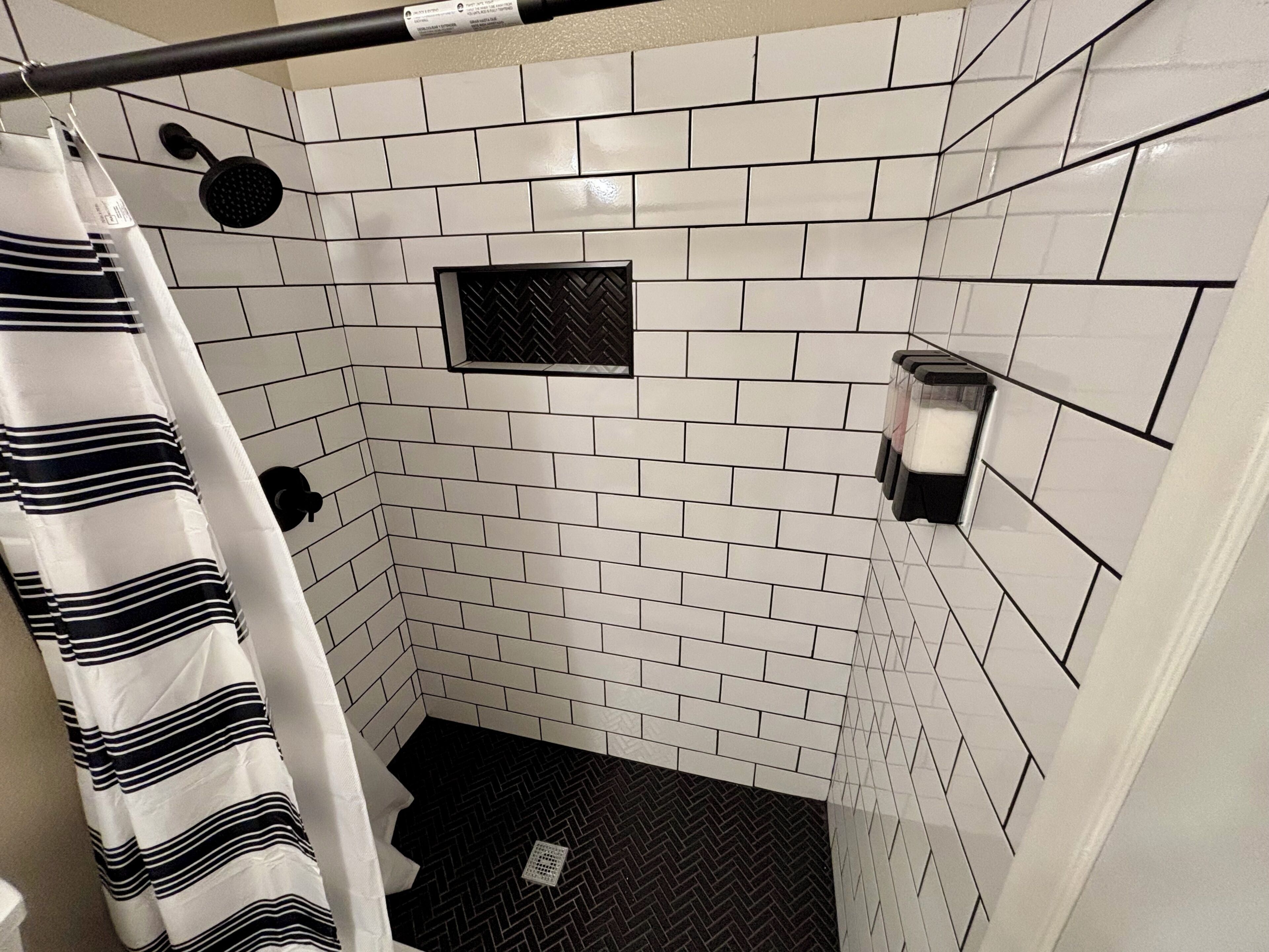 Shower, towels, soap, toilet paper