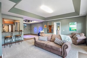 House, Multiple Beds, Patio (42 Branch) | Living area - Sleeps 26 Lakefront w/ Private Dock & Dance Floor! (Lake Ozark)