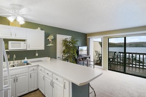 Apartment, 1 King Bed, Patio, Pool View (6620 Weston Point A3) | Private kitchen - Lakefront Condo Near Margaritaville (Osage Beach)