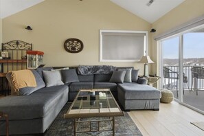 Condo, Multiple Beds, Patio (275 Flynn Road 406 ) | Living area - Waterfront Lake of the Ozarks Retreat (Lake Ozark)