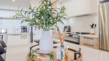 Coffee/tea maker, fridge, microwave, oven