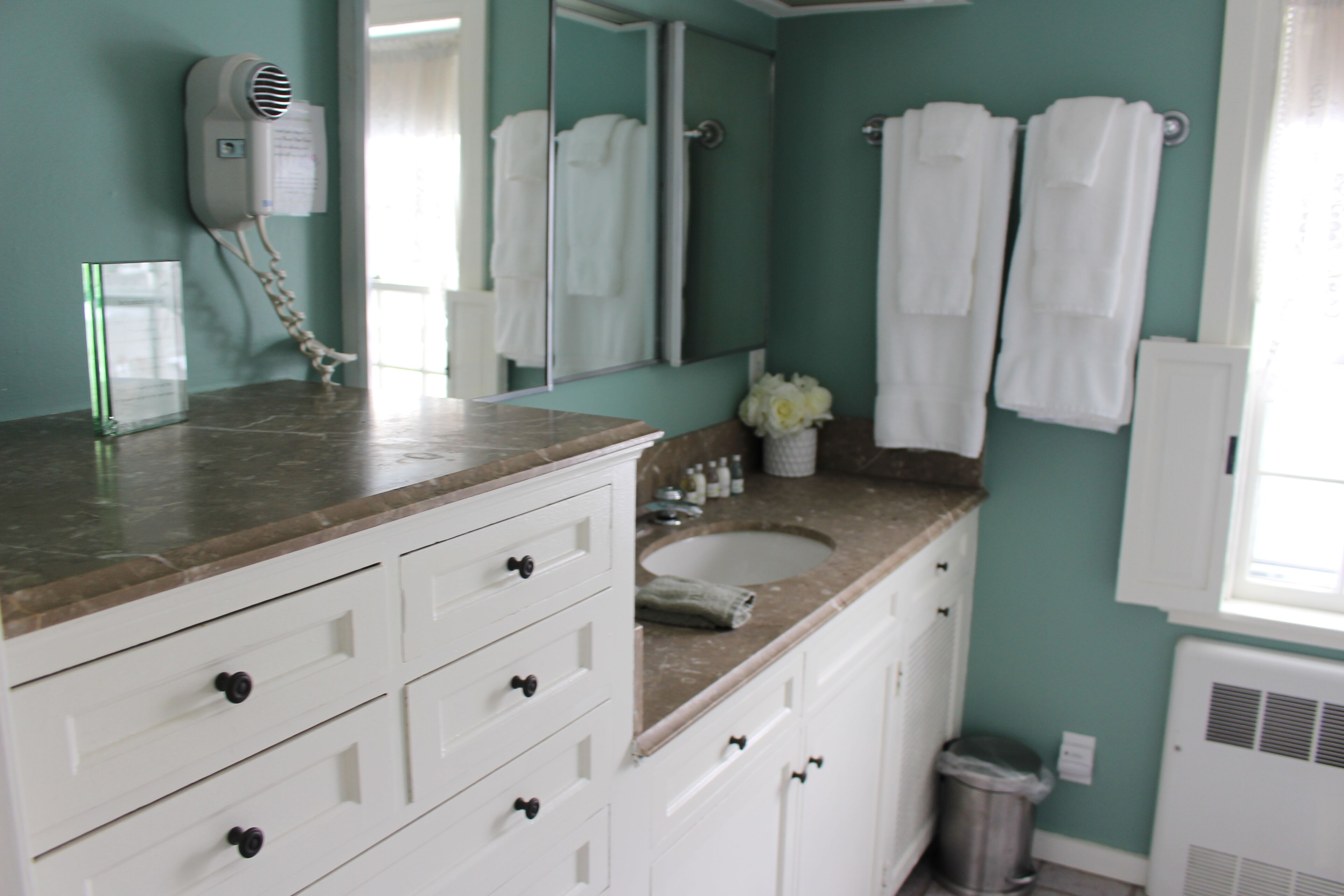 Hair dryer, towels, soap, toilet paper