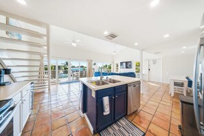 Fridge, microwave, oven, stovetop - Sea Dreams on 9, 3 bedroom 3 bath 1/2 duplex, Private Pool in Key Colony Beach waterfront with 37 ft dockage and cabana club private membership, pool table and putting green. (Key Colony Beach)