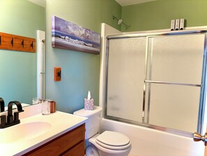 Shower, towels, soap, toilet paper
