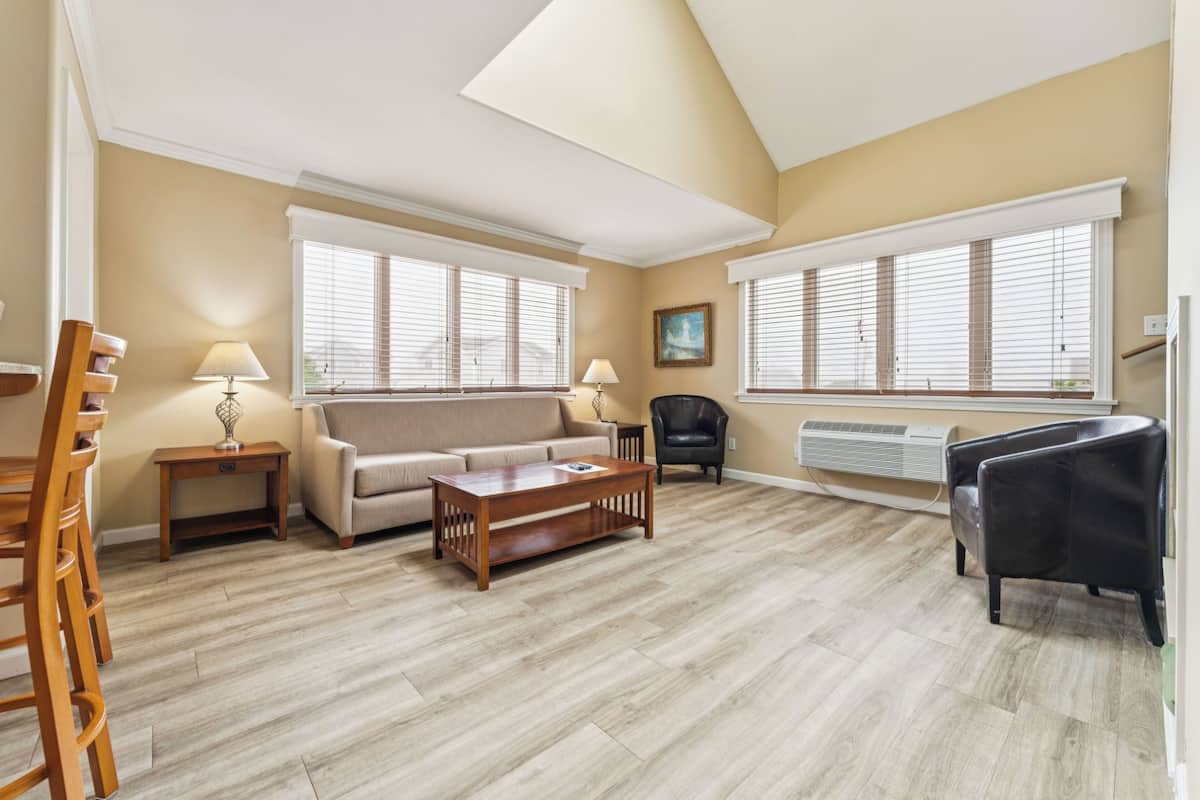 Family Condo, 2 Bedrooms | Living area | 48-inch flat-screen TV with cable channels