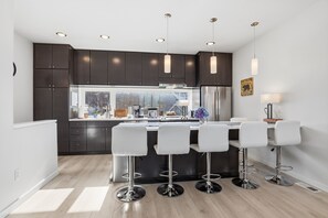 Fridge, microwave, oven, stovetop - Modern Hideaway with Private Terrace in Downtown (Anchorage)