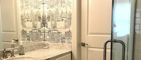 Shower, towels, toilet paper