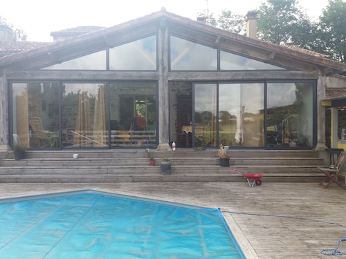 Large, quiet country house with terrace, swimming pool and wooded garden