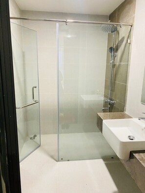 Shower, hair dryer, towels, soap