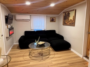 Living area - Peaceful 4-bedroom farmhouse w/ hot tub close to SXS trails and WinterPlace (Rock)