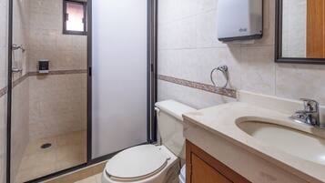 Shower, towels, soap, toilet paper