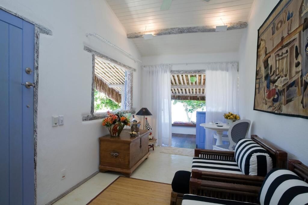 Quarto casal luxo, vista para o mar | Área de estar