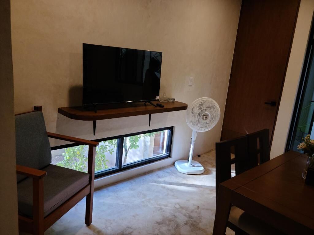 Lägenhet - balkong - utsikt mot trädgården | Restauranger