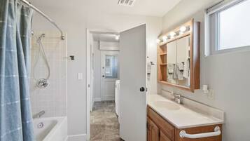 Hair dryer, towels, soap, toilet paper