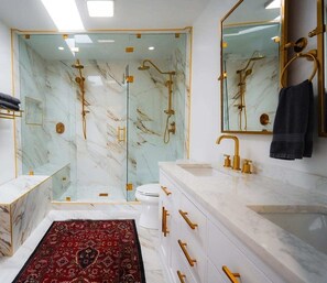 Shower, hair dryer, bidet, towels