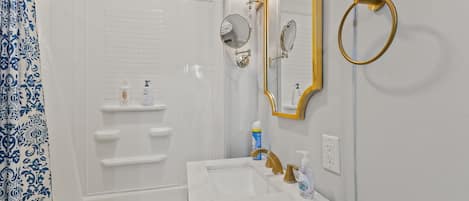 Hair dryer, towels, soap, shampoo