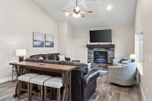 Smart TV, fireplace, books