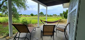 Terrace/patio - Golf Cart Included - 3BR, 2BA - 2 Blocks to Beach - 3 Pools Nearby -Tidal Marsh (Saint Helena Island)