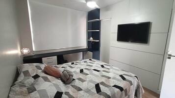 Ferros/tábuas de passar roupa, acesso à internet, roupa de cama