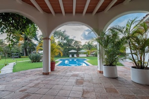 Outdoor pool, pool umbrellas, pool loungers