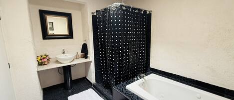 Jetted tub, towels, soap, toilet paper