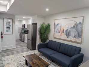 TV - Quiet Luxury: 1.5GB Fiber, 85 inch Cinema, Workstation, Laundry & Full Kitchen (Calgary)