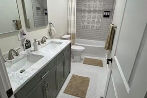Shower, hair dryer, towels, soap - Beautifully Remodeled Luxury Cabin featuring a Large Game Room and Fire pit! (Sevierville)