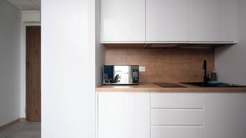 Fridge, microwave, stovetop, coffee/tea maker