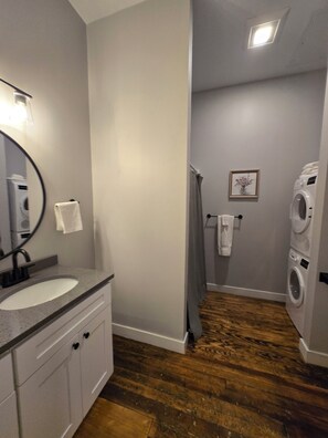Shower, towels, soap, toilet paper