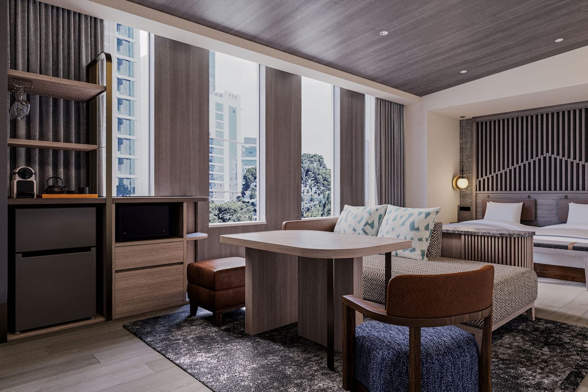 Quarto duplo executivo, vista para a cidade | Wi-Fi de cortesia, roupa de cama