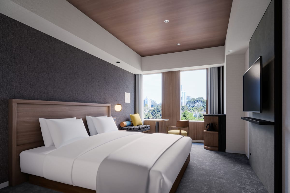 Quarto casal superior, vista para a cidade | Wi-Fi de cortesia, roupa de cama