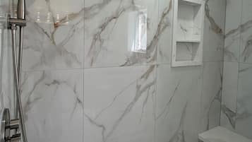 Shower, jetted tub, hair dryer, towels