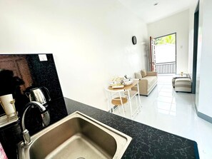 Zona de menjador de l'habitació