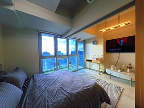 Classic Condo, City View | Iron/ironing board, free WiFi - 35th Uptown Park Suites Tower 2 BGC (Taguig)
